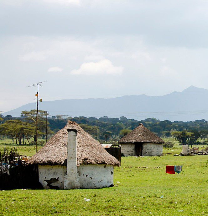 Traditional Maasai village in Kenya with thatched huts