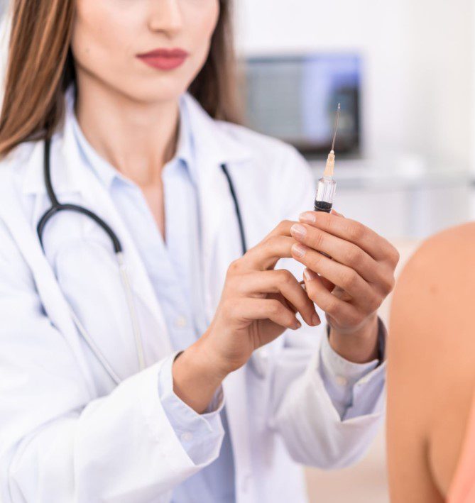 Traveler receiving yellow fever vaccination before visiting Kenya